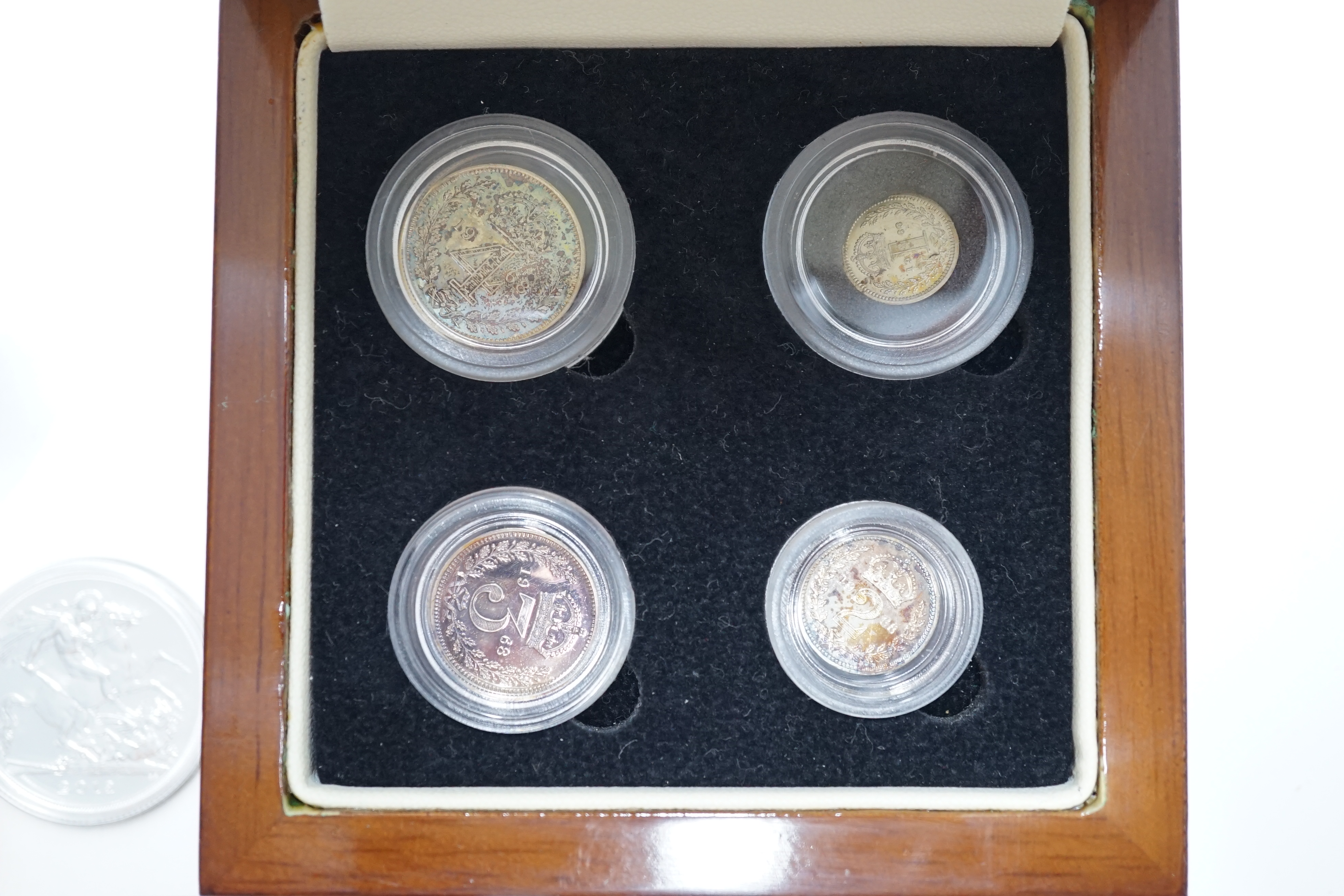 British silver coins, Elizabeth II four coin set of Maundy coins, 1968, toned UNC, in London mint case and a 2013 fine silver £20 coin, St. George & The Dragon (2)